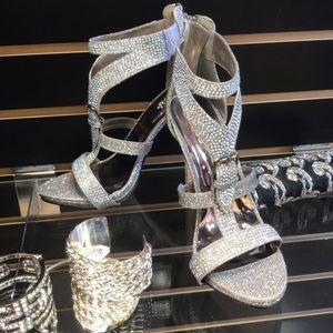 Silver sparkly heel. About 3.5 inch heel. All new